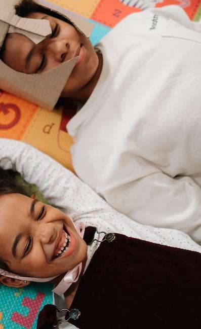 Two children smiling